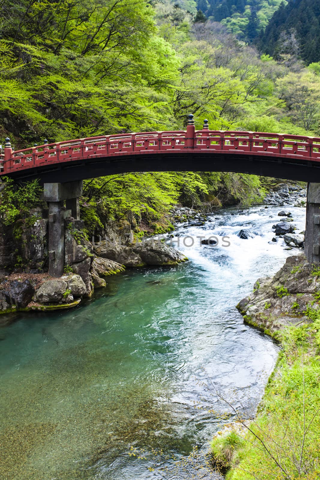 Red sacred bridge Shinkyo in UNESCO site of Nikko, Japan  by mariusz_prusaczyk