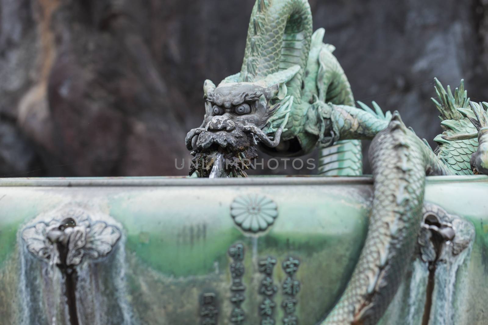 Traditional Dragon Bamboo Fountain in Japan by mariusz_prusaczyk