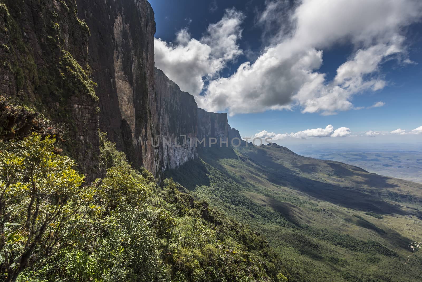 Trail down from the plateau Roraima passes under a falls - Venezuela, South America

