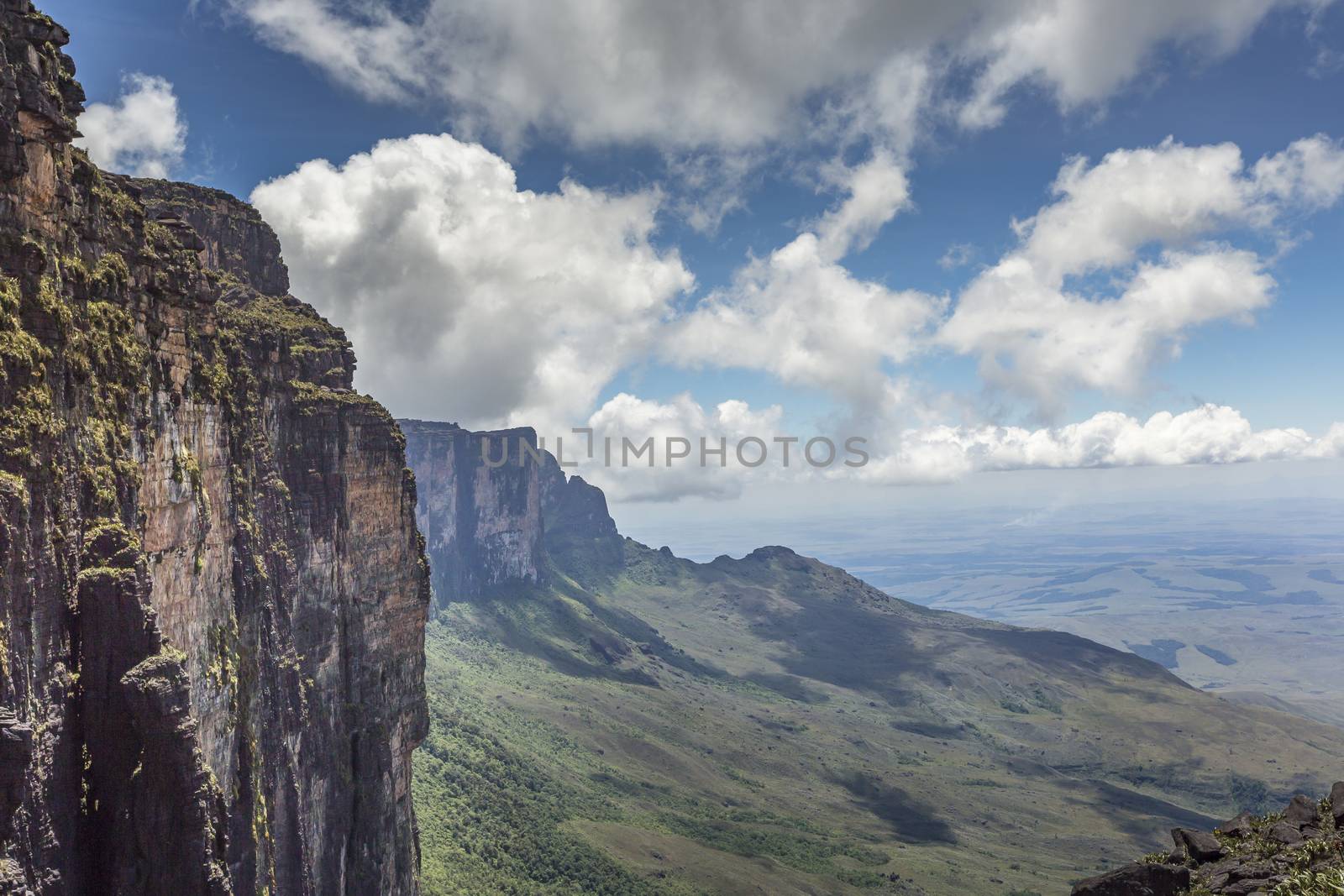 Trail down from the plateau Roraima passes under a falls - Venezuela, South America

