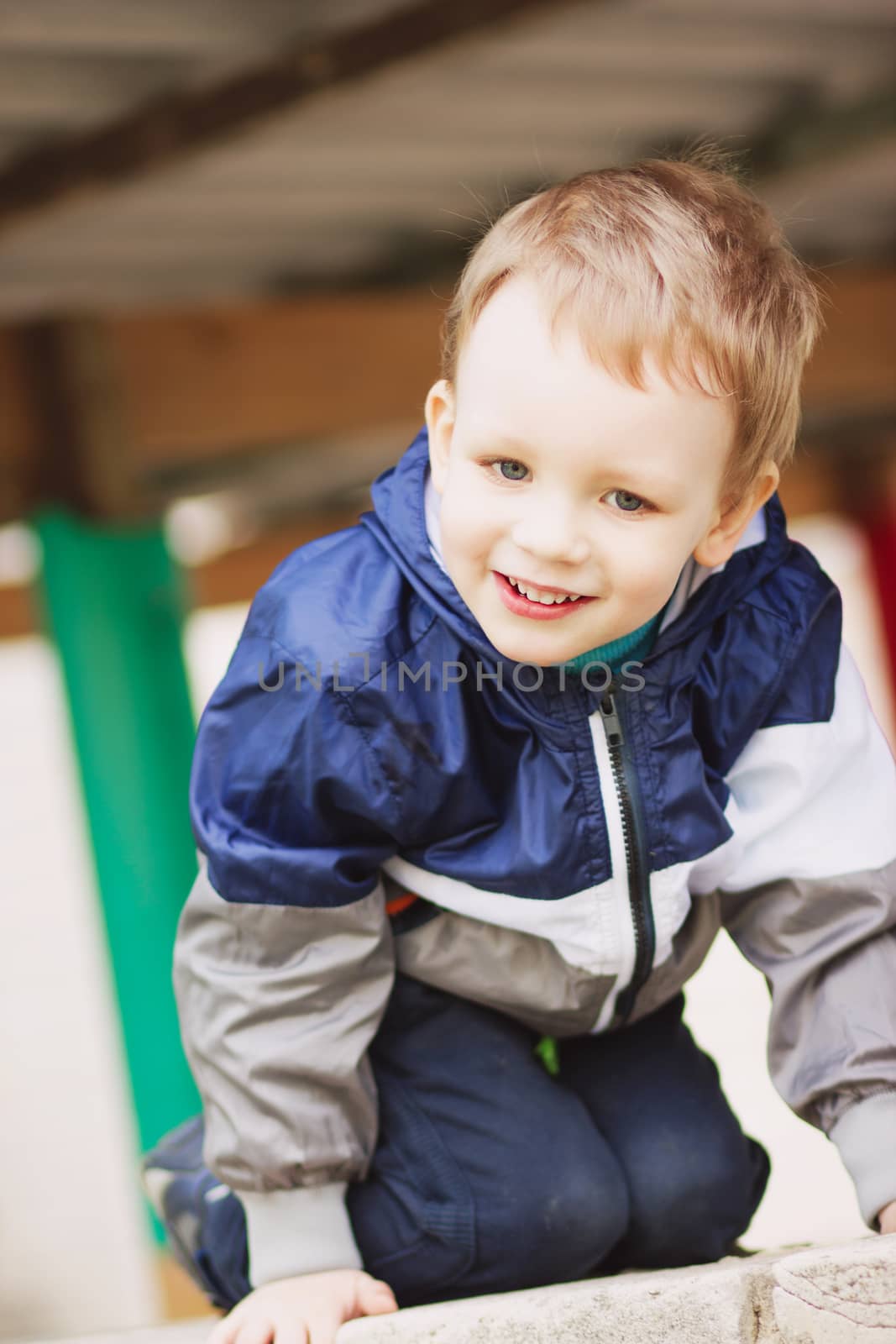 Portrait of cute little baby boy outdoors