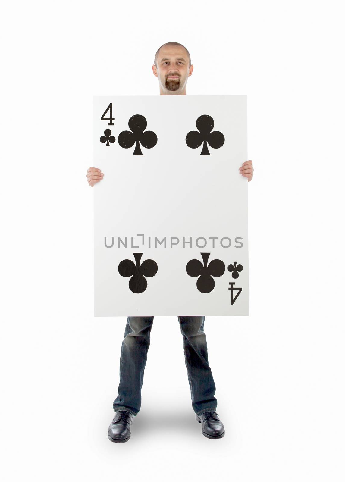 Businessman with large playing card - Four of clubs