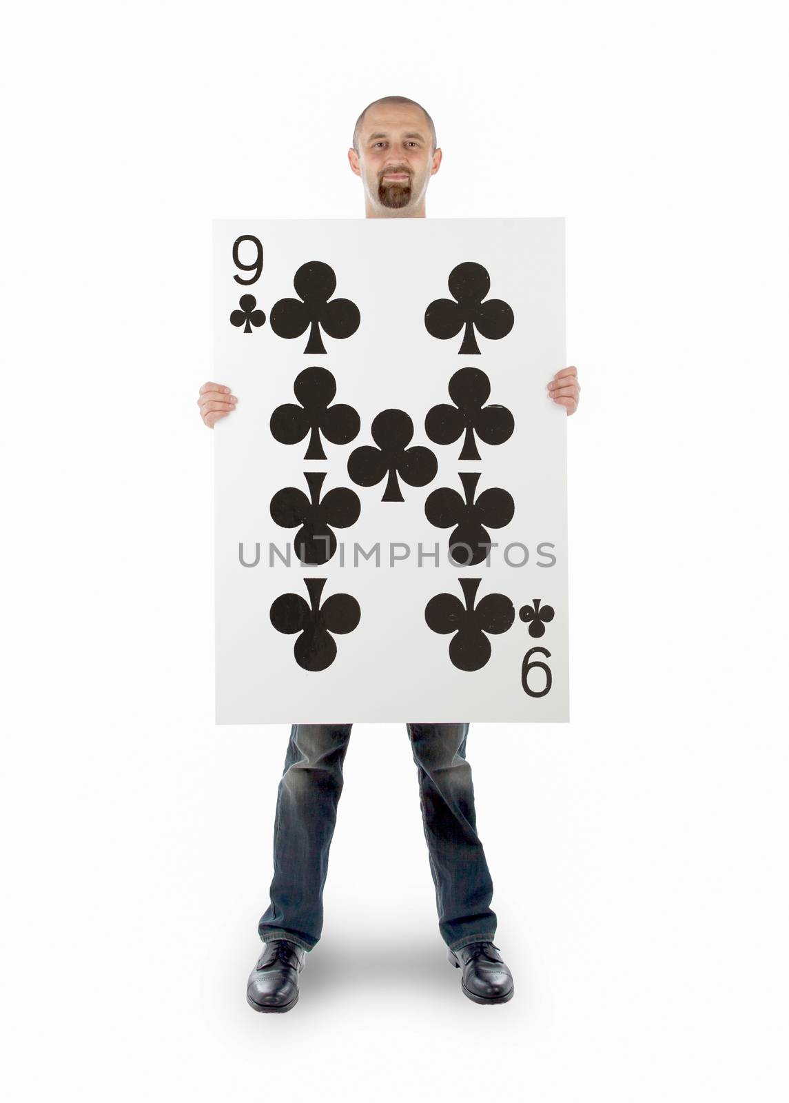 Businessman with large playing card by michaklootwijk