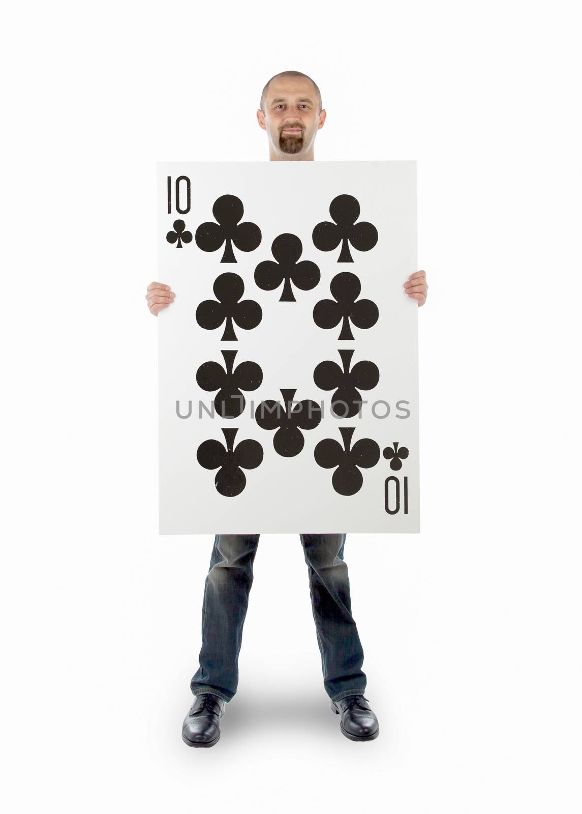 Businessman with large playing card - Ten of clubs