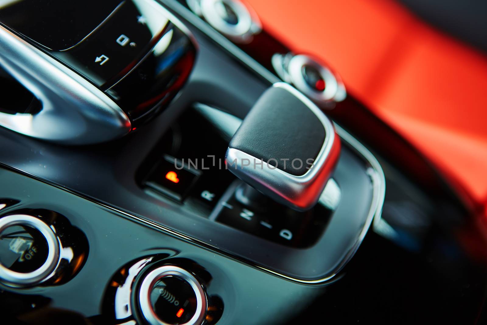 Detail of modern car interior, gear stick, automatic transmission in expensive car