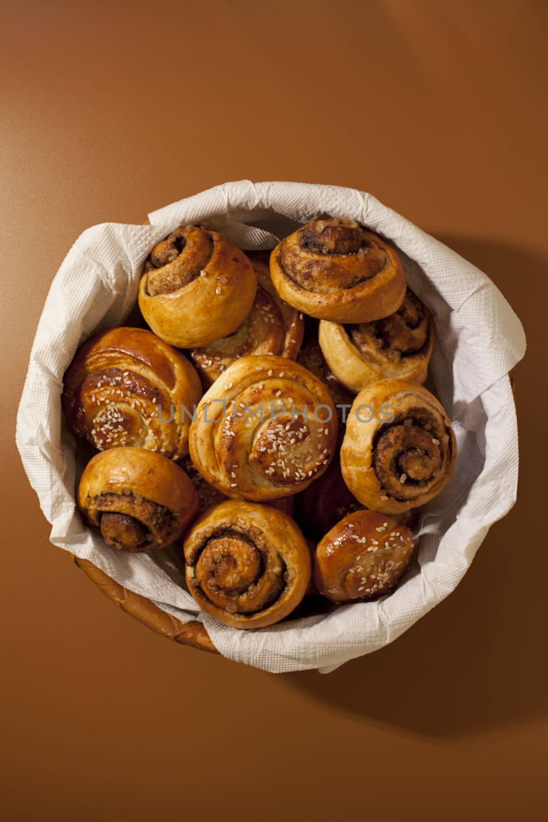 ruddy crispy rolls, Full sweet bread, hot cakes, cinnamon  sesame seeds, overhead shot, 