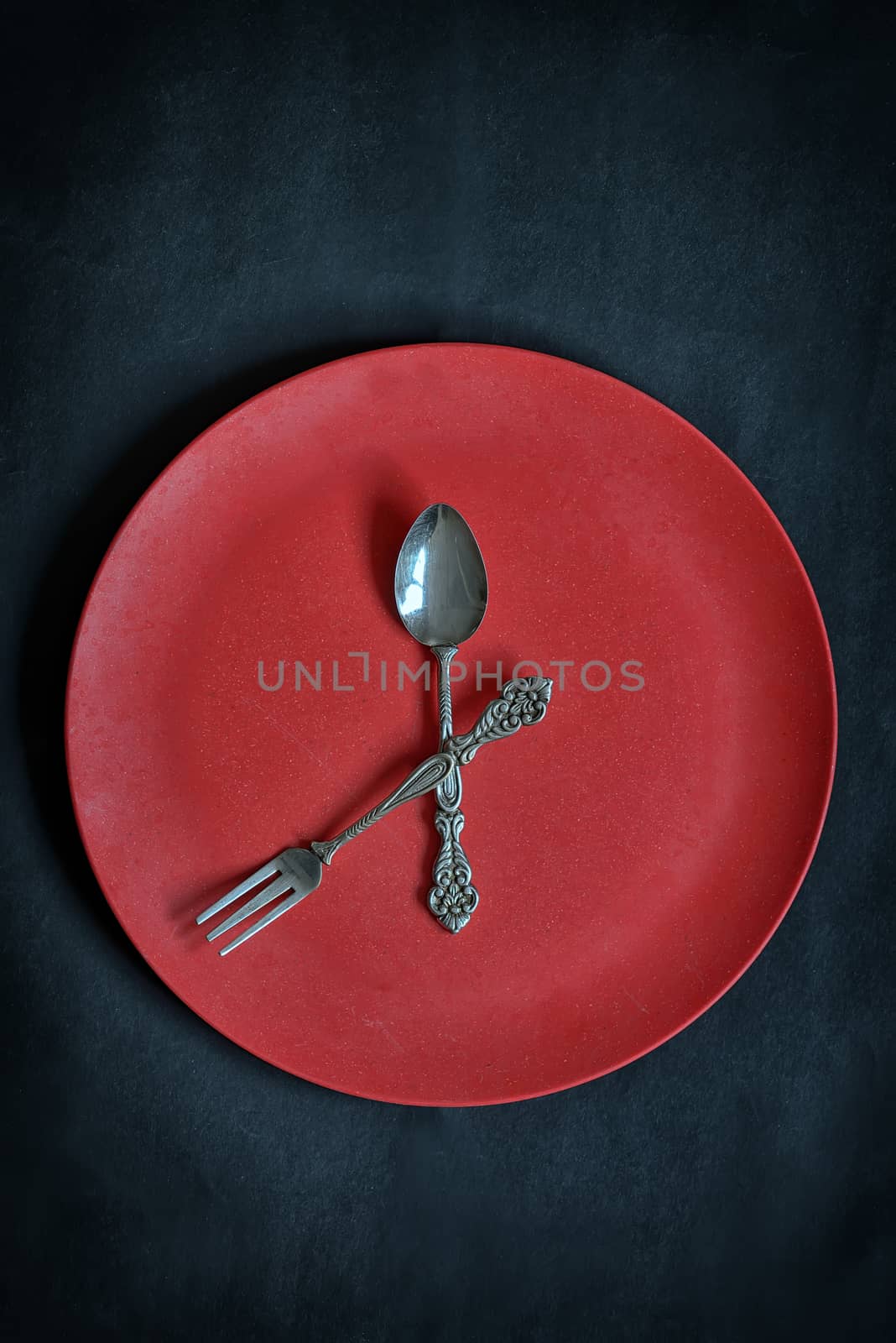 Clock with red plate, spoon and fork by mady70