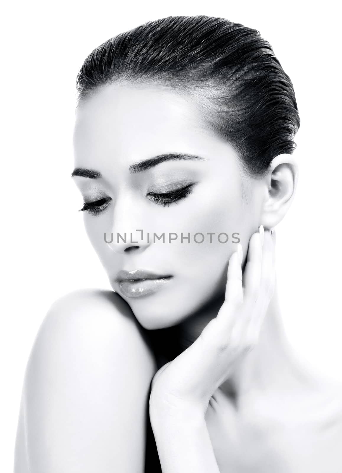 Beautiful young woman with healthy skin by Nobilior