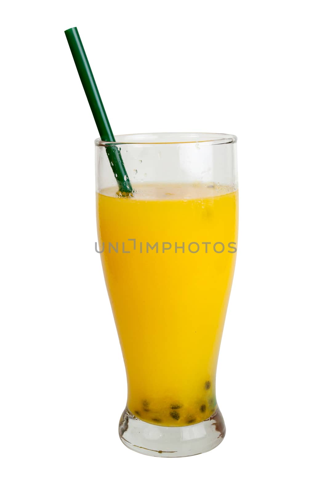 Passion fruit juice in glass. Isolated on white with work paths