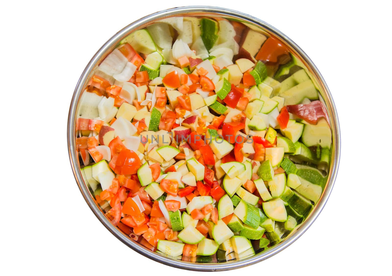 Salad diced into a large stainless bowl by ben44