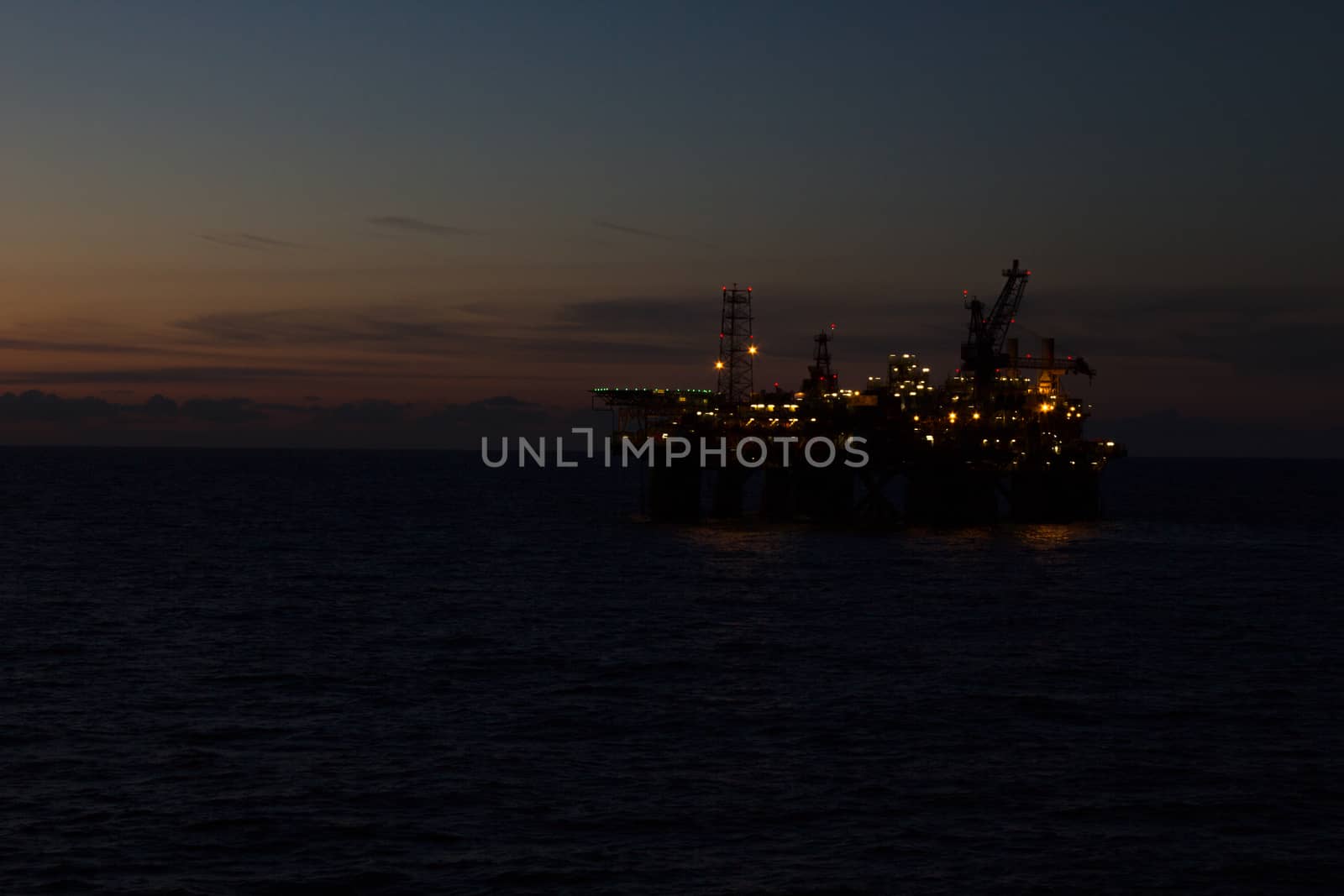 Offshore rig in the sunset