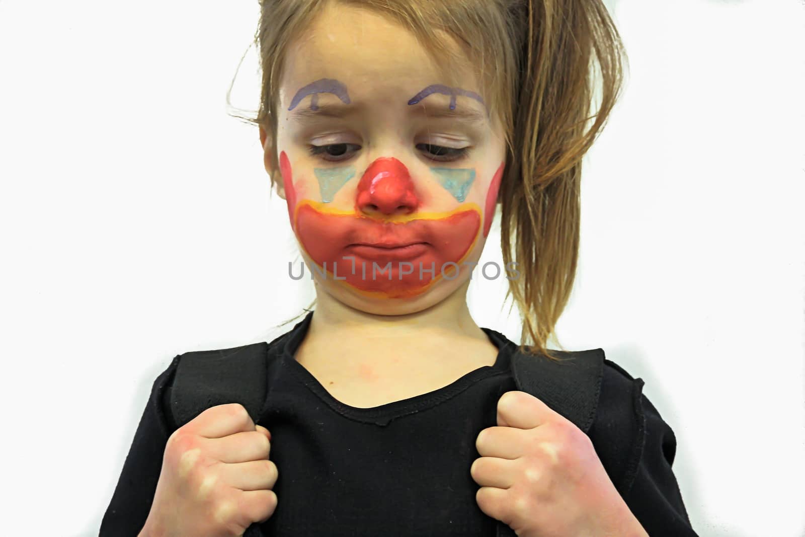 Beautiful Little Girl With Clown Makeup