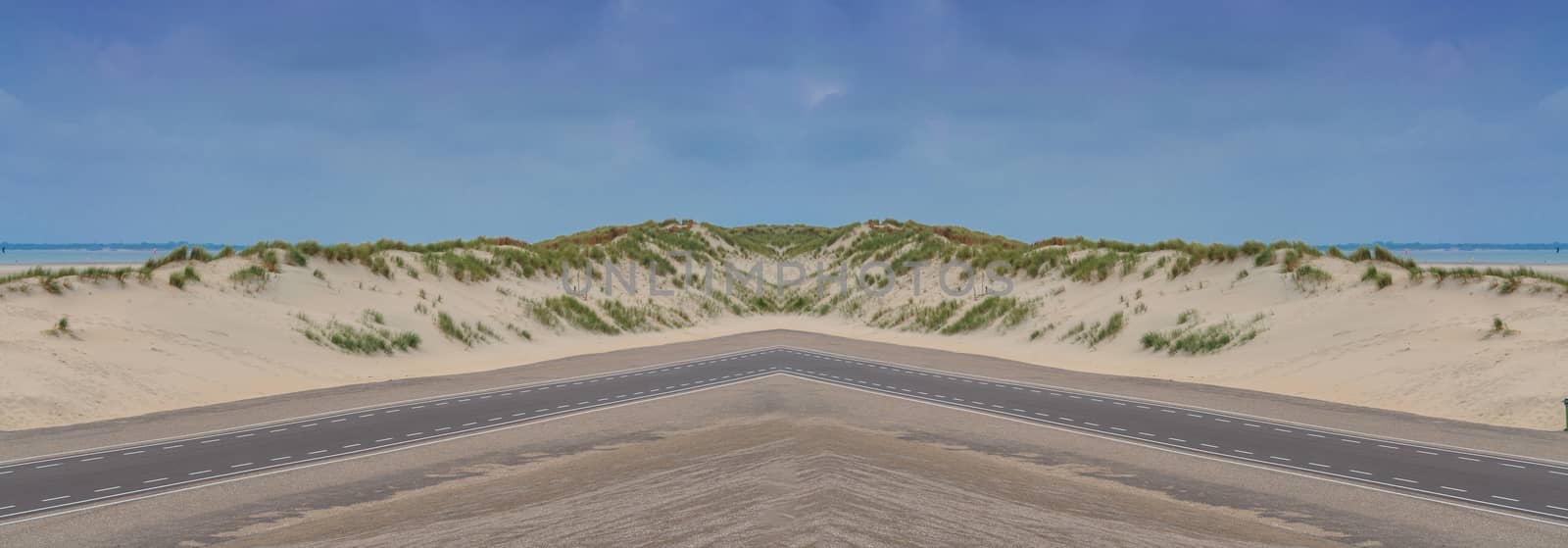 Panorama of a sunny natural landscape with great sand dunes in the Netherlands.
