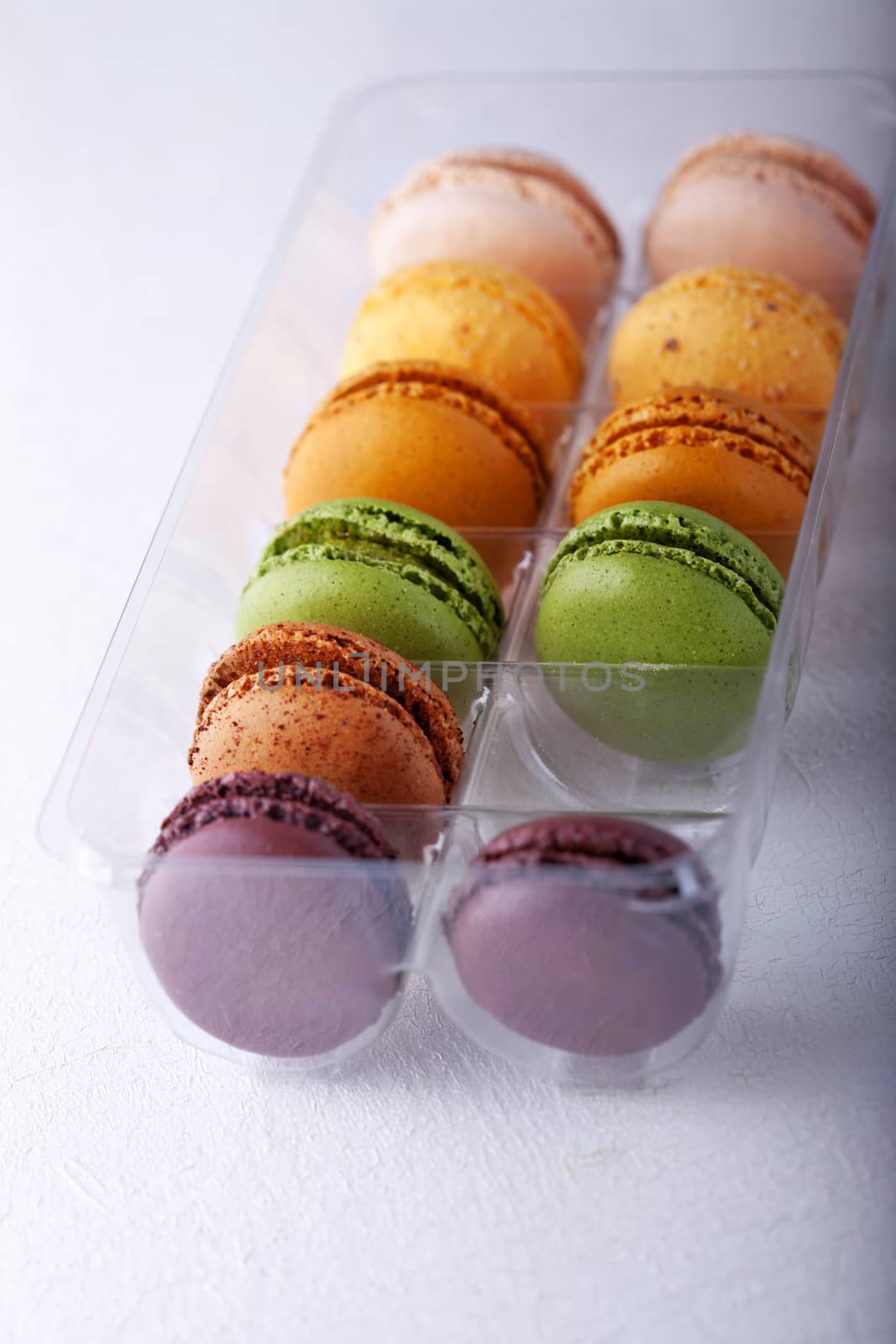 Multicolored Almond cookies Macaroons in a Box