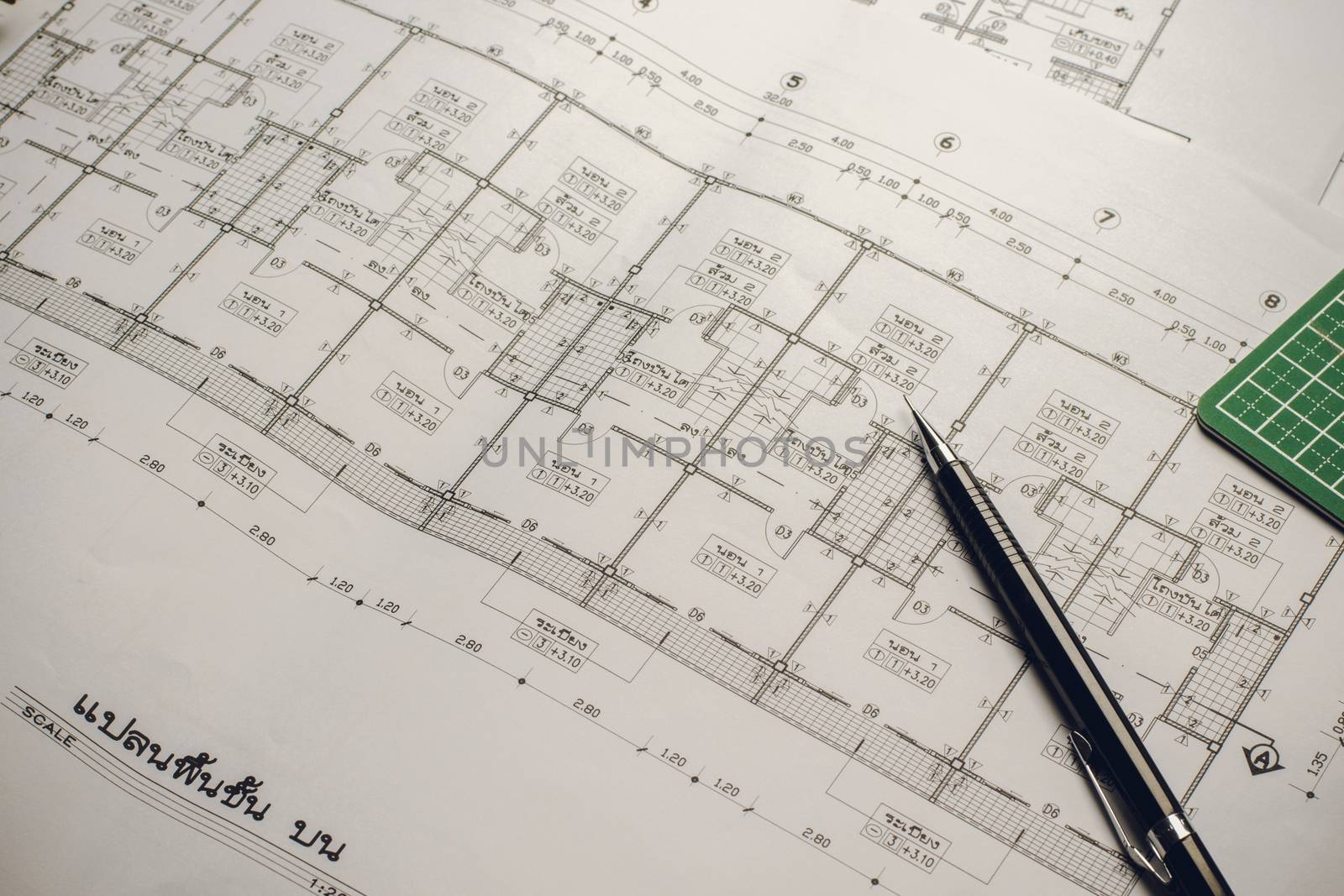 engineering diagram blueprint paper drafting project sketch architectural,selective focus.