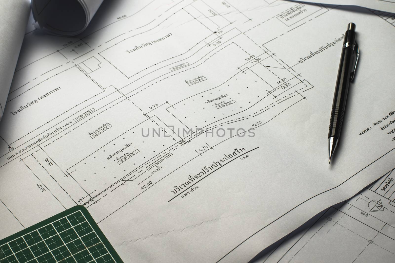 engineering diagram blueprint paper drafting project sketch architectural,selective focus.