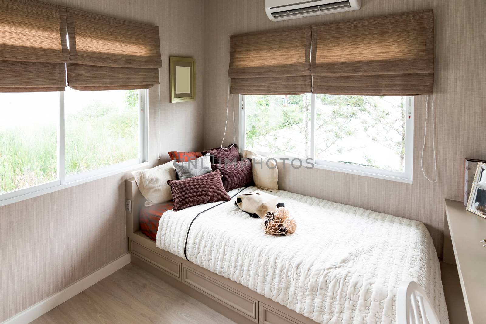 Beautiful room interior with hardwood floors and view of new luxury home.