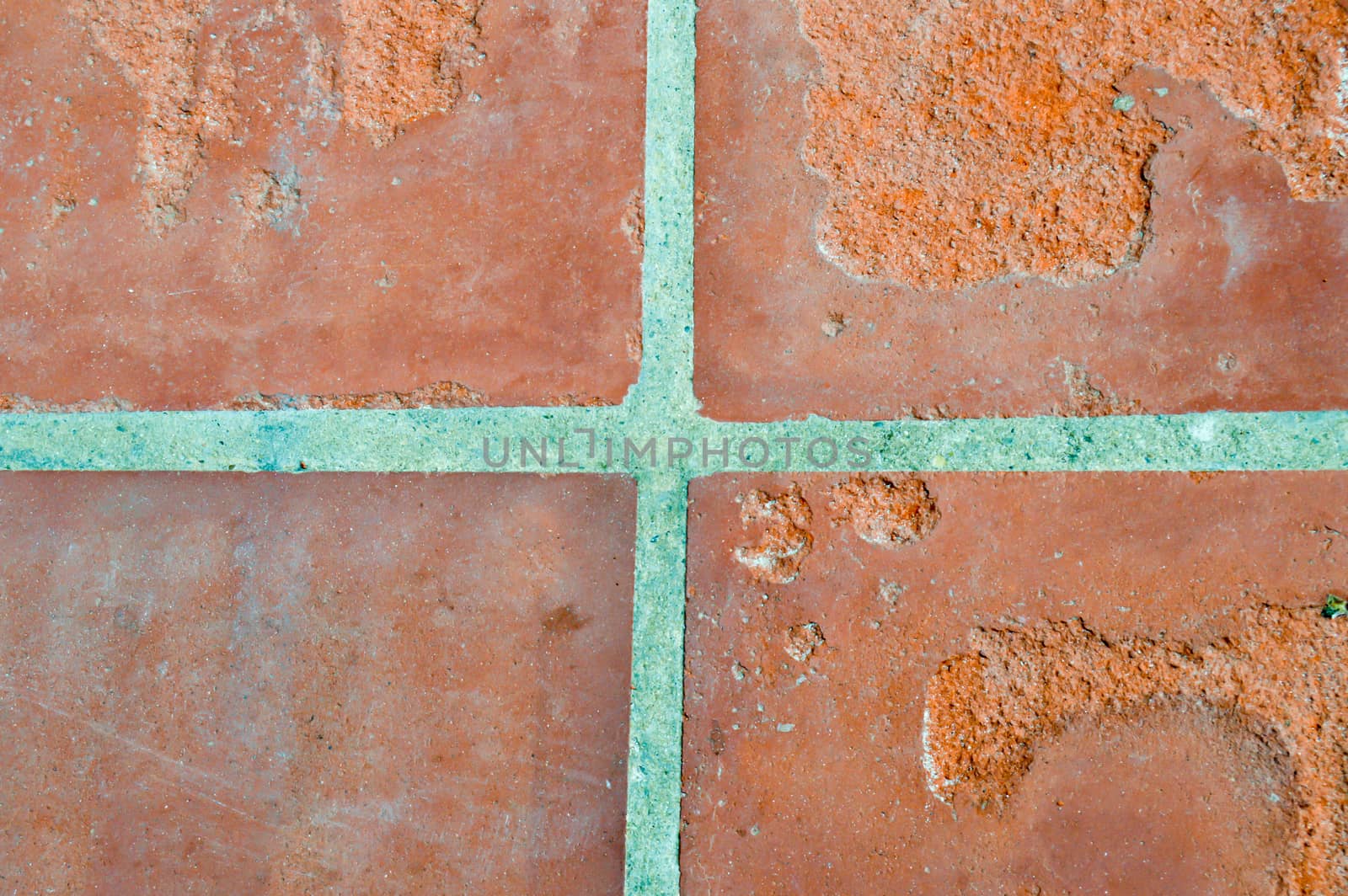 Red brick background with a joint cross
