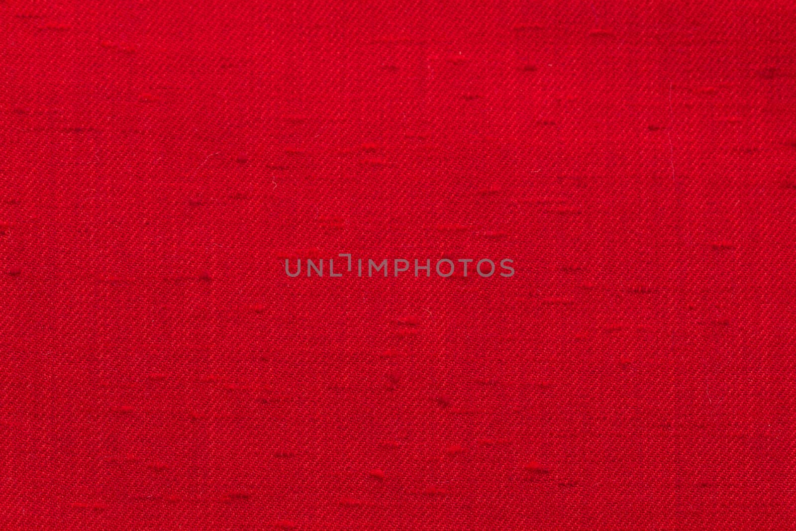 Rustic canvas fabric texture in red color.