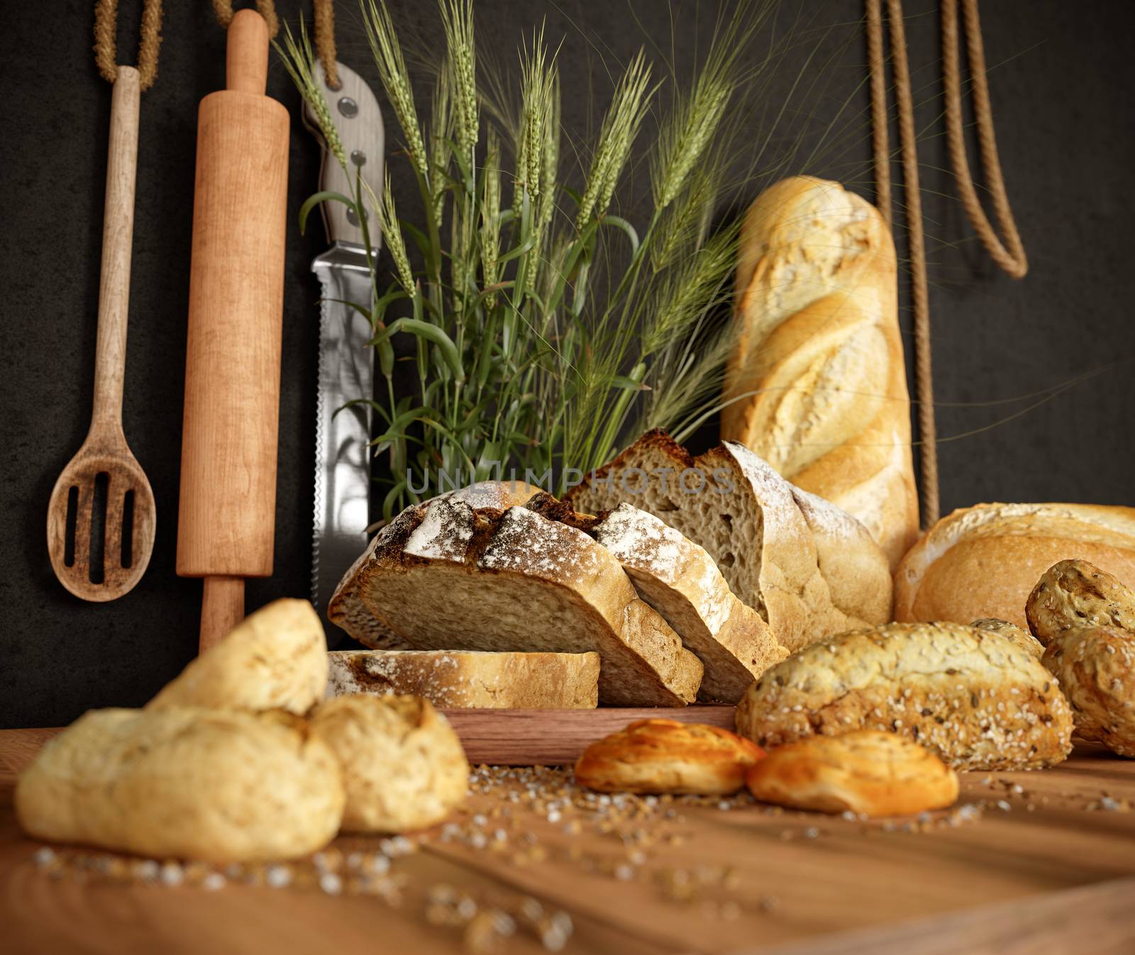 Fresh bread with wheat on a slate cutting board and  photo background copy space by denisgo