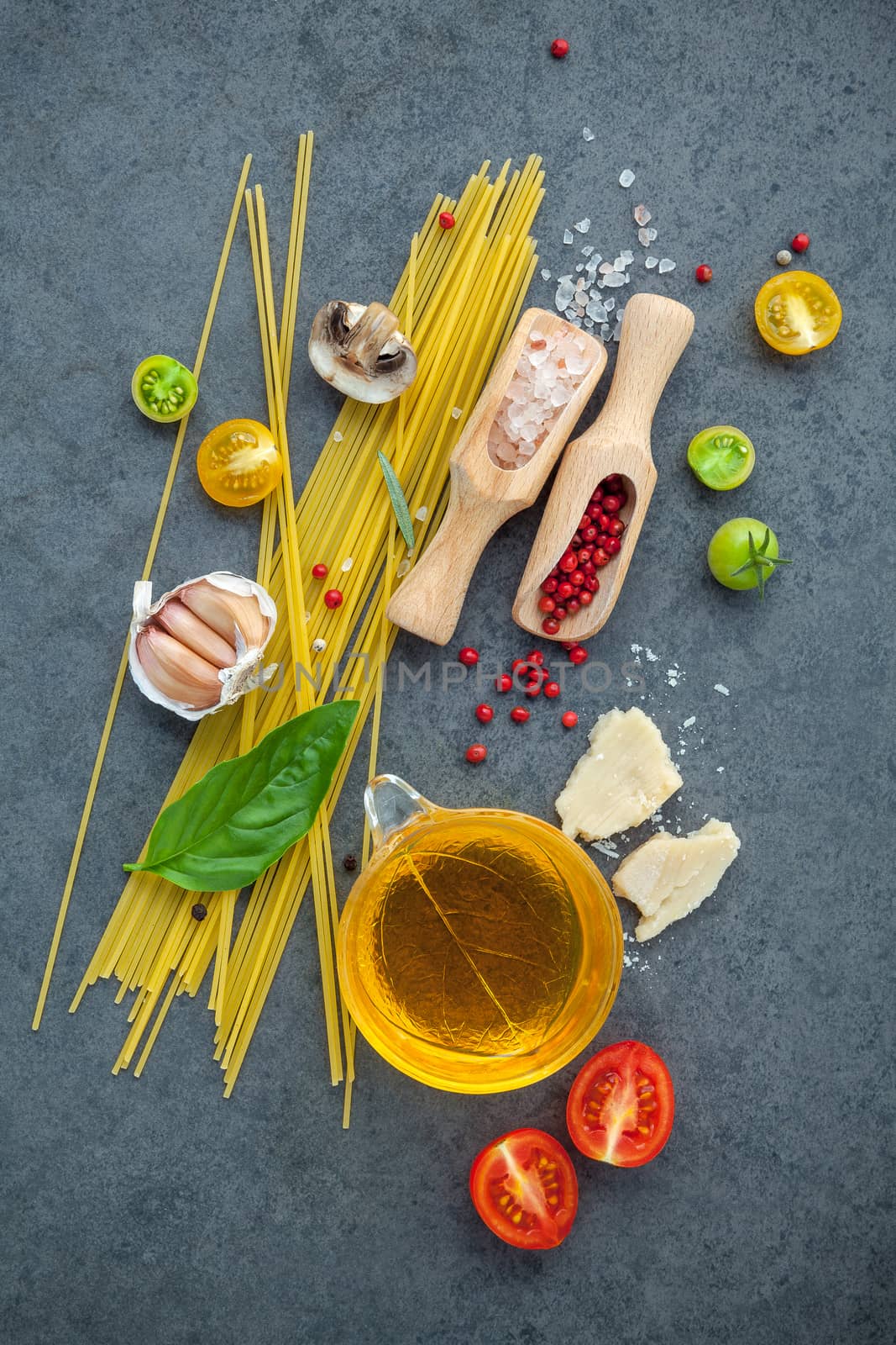 Italian food concept. Spaghetti with ingredients sweet basil ,to by kerdkanno