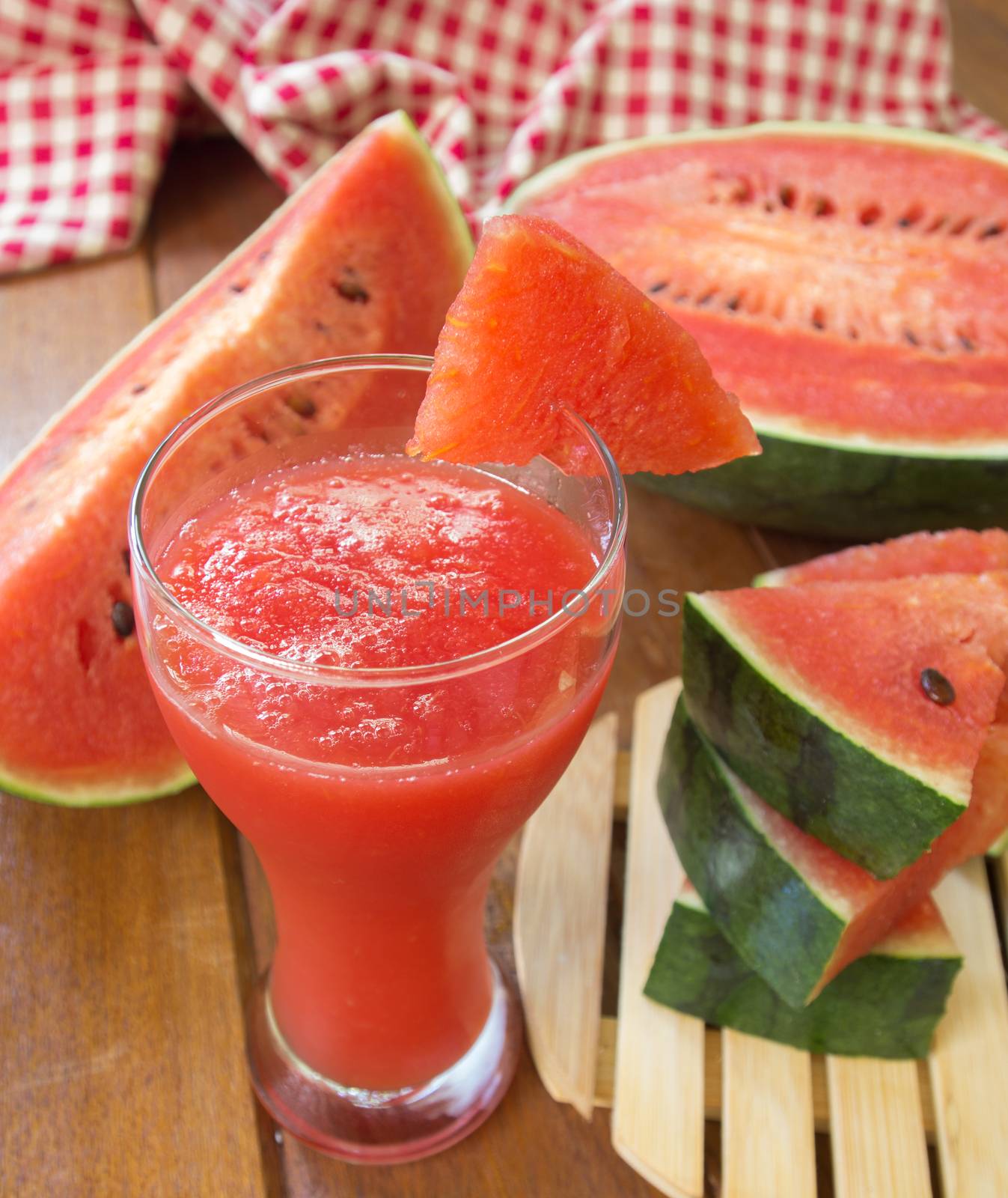 Fresh watermelon and glass of watermelon smoothie