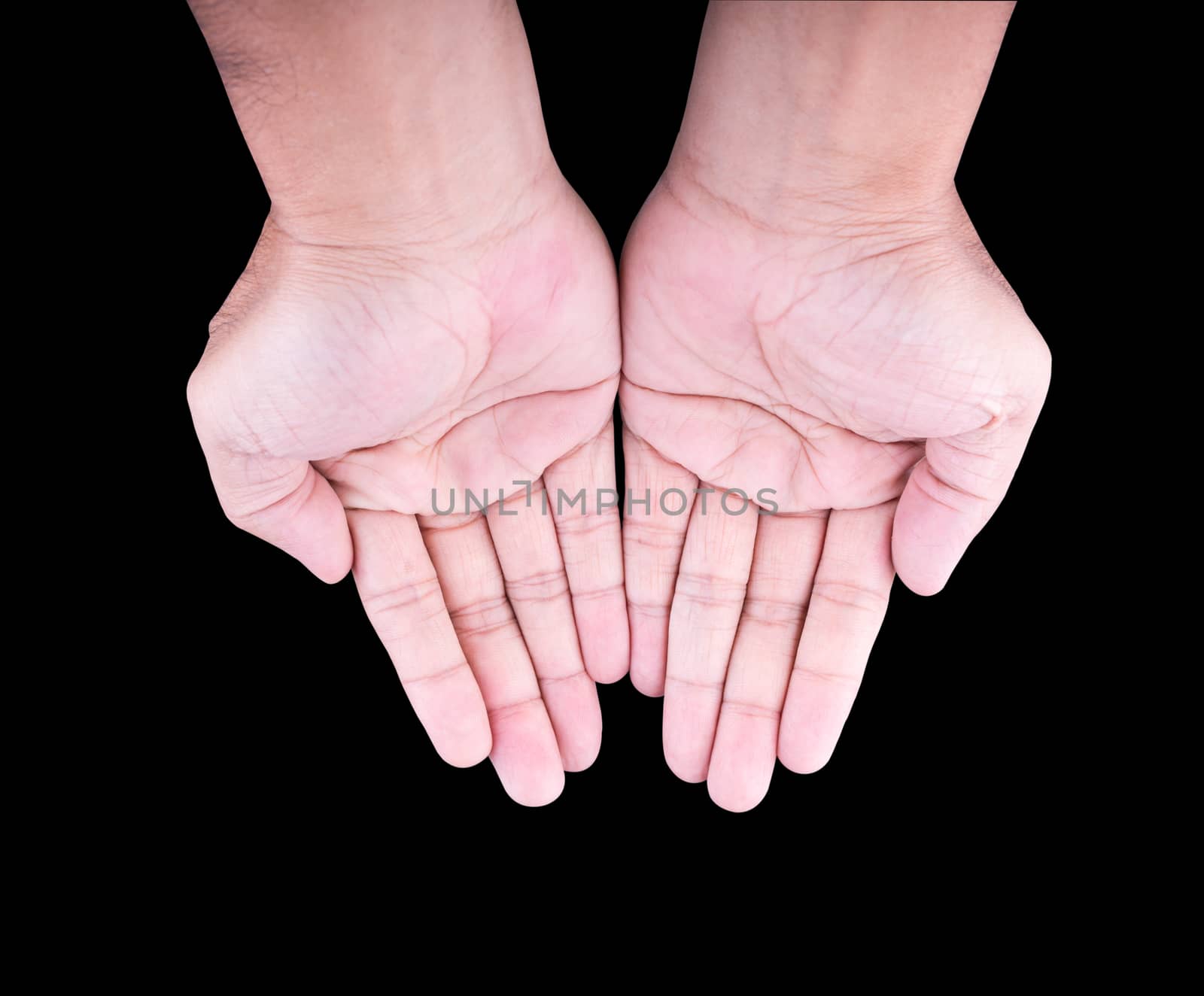 palms of man on a black background.