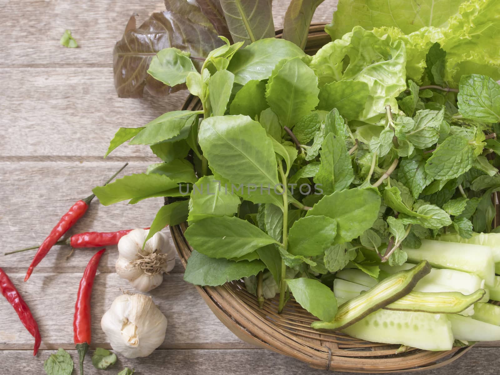 vegetable in basket on wooden table