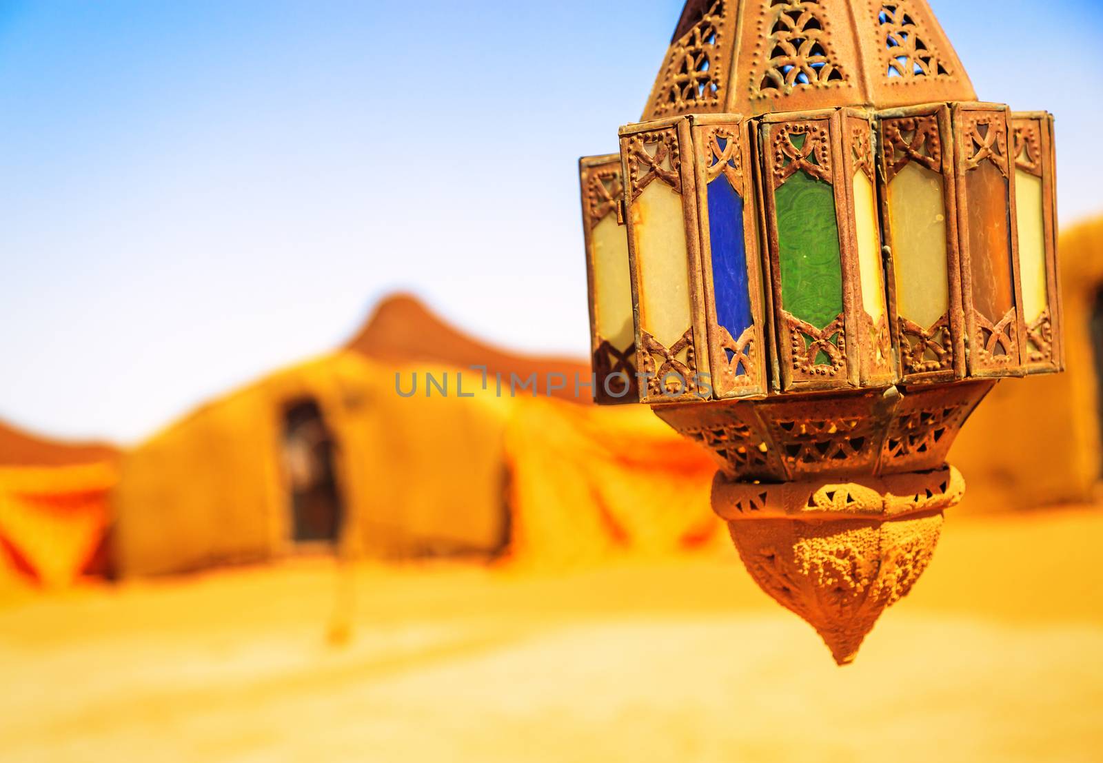 coloreful berber lamp with traditional nomad tents on background by pixinoo