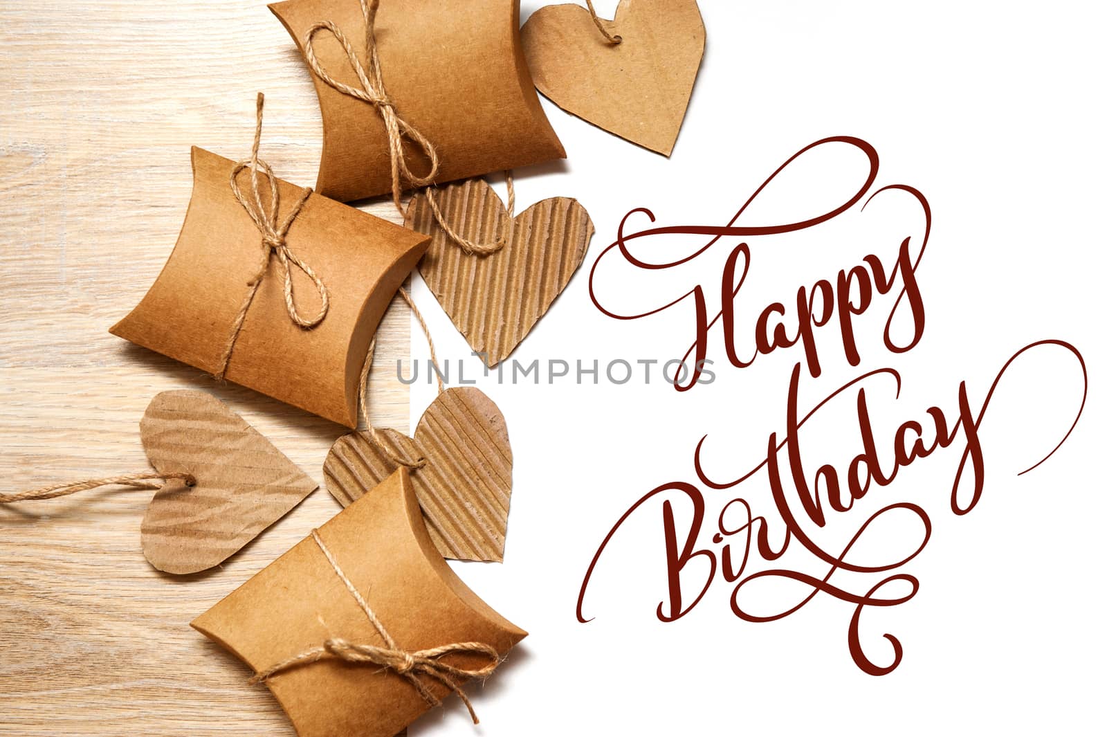 Valentine Gift and Heart on white background and text Happy Birthday. Calligraphy lettering.