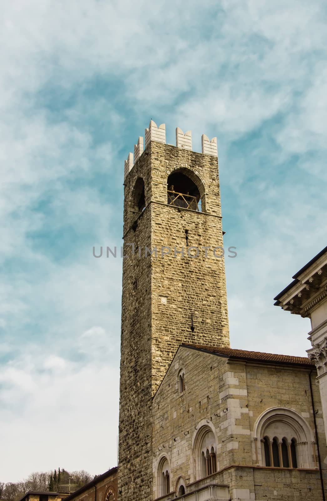 Tower of Pegol or Tower of the People, is the stone tower of Broletto Palace