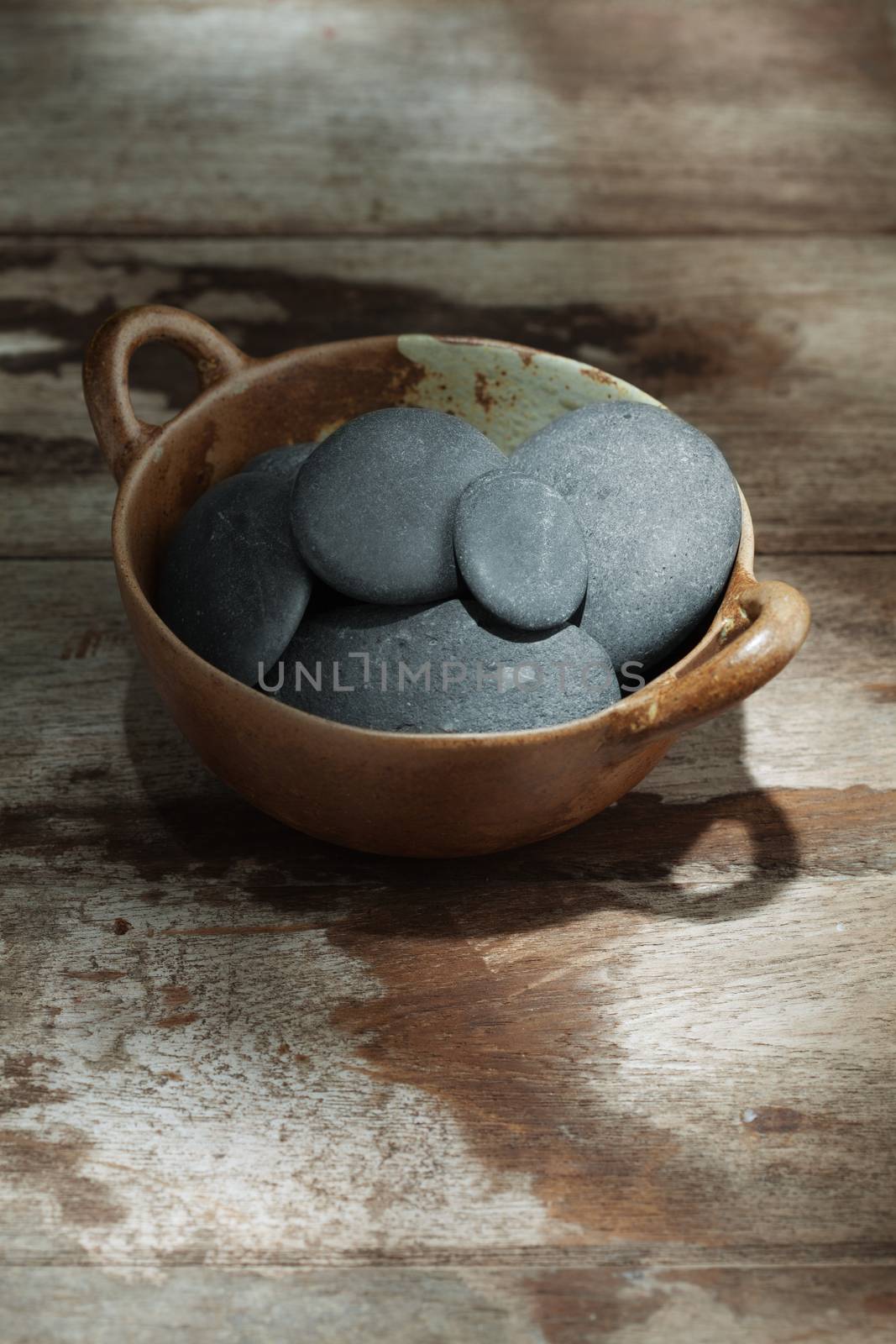 close up view of gray stones on color back