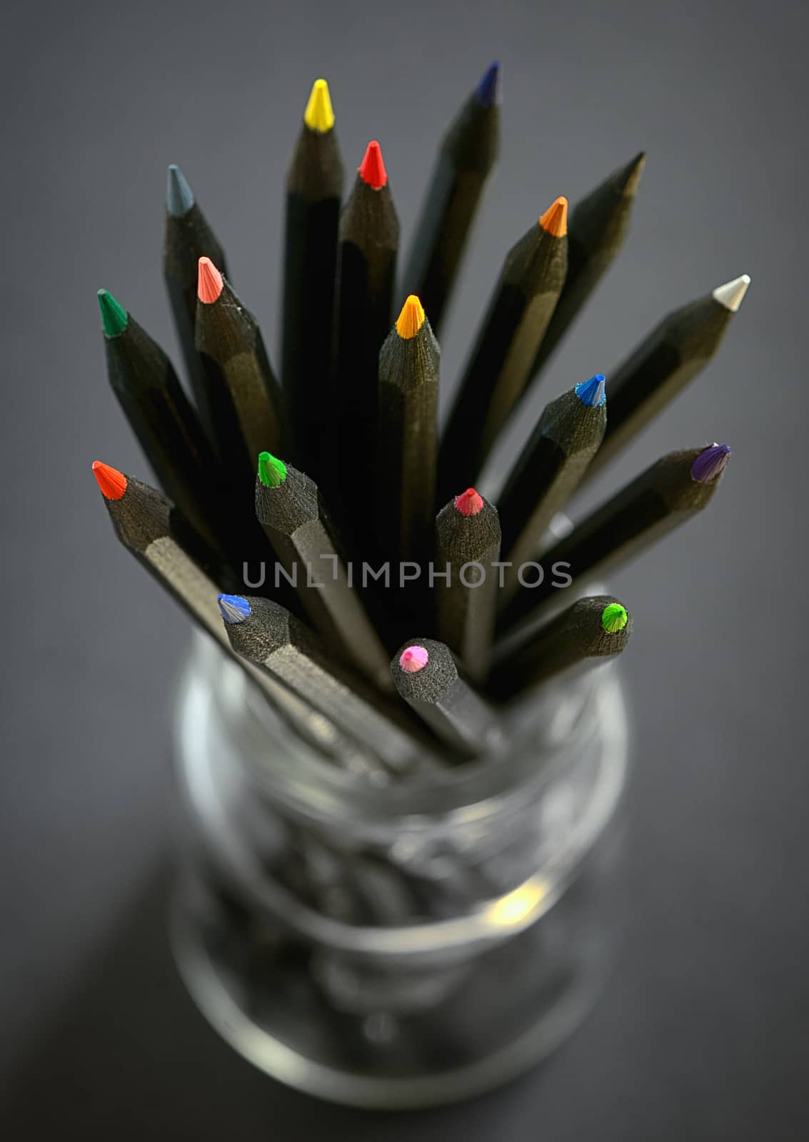 Colored  black pencils in jar