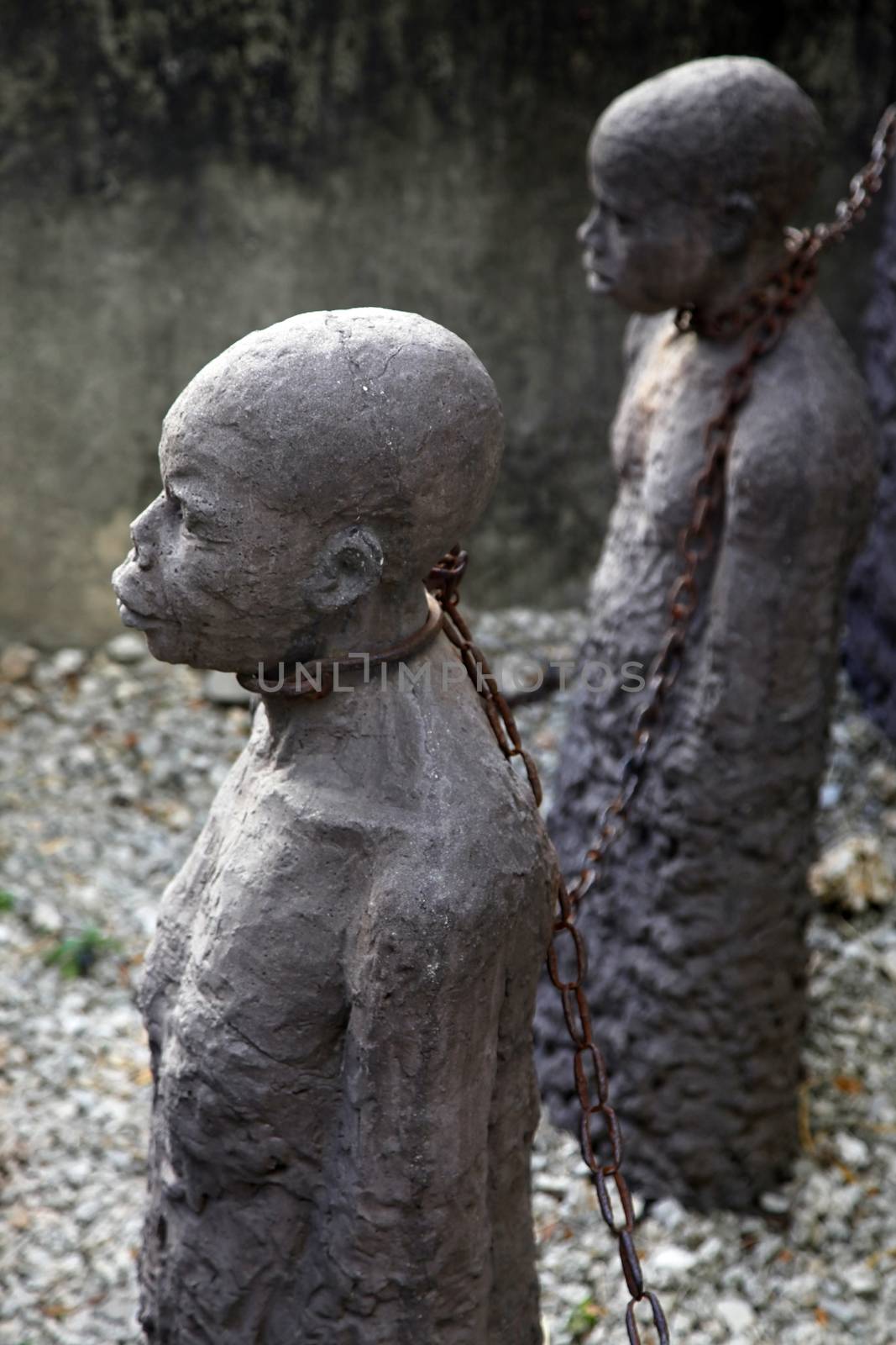 A statue in Stone Town. Zanzibar dipicting and mourning the African slave trade