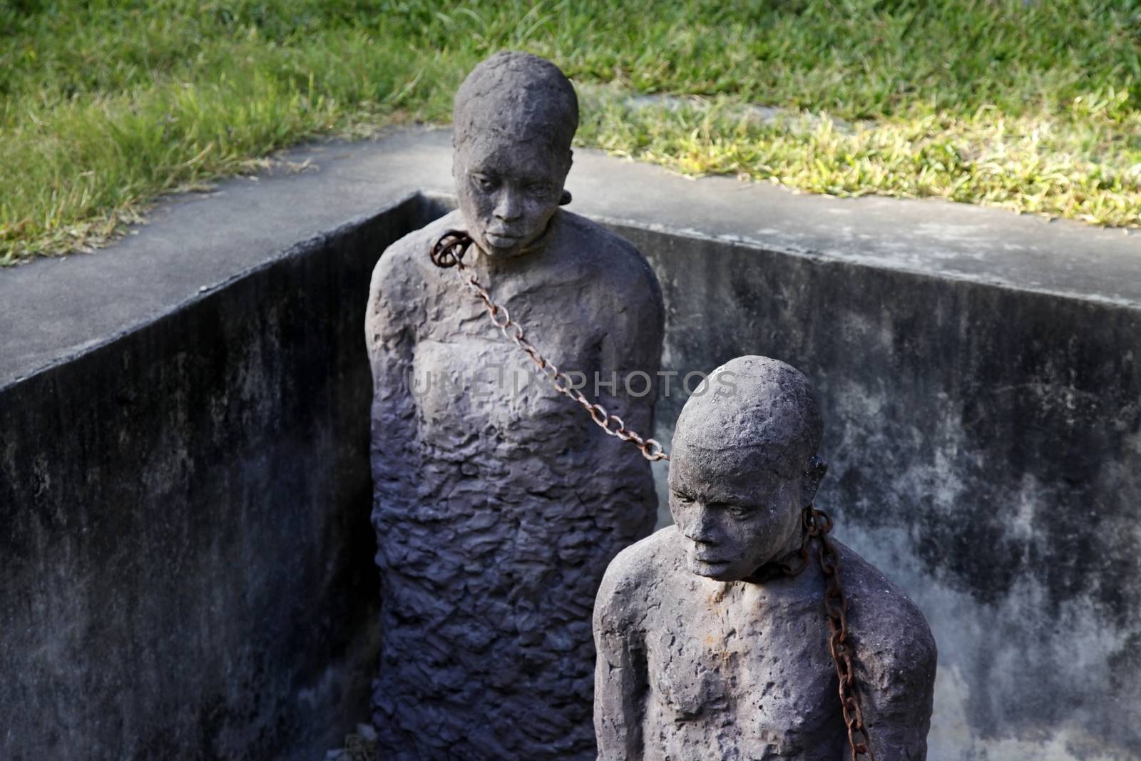 A statue in Stone Town. Zanzibar dipicting and mourning the African slave trade
