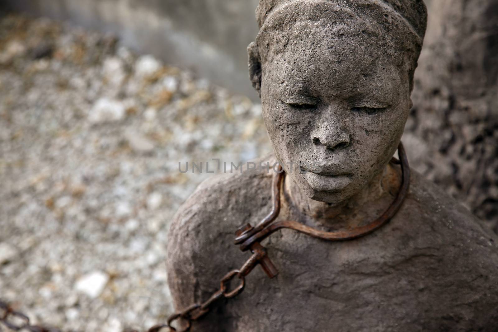 A statue in Stone Town. Zanzibar dipicting and mourning the African slave trade
