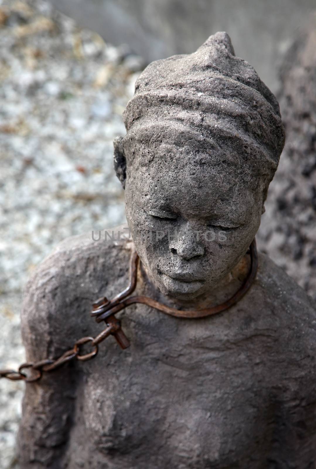 A statue in Stone Town. Zanzibar dipicting and mourning the African slave trade