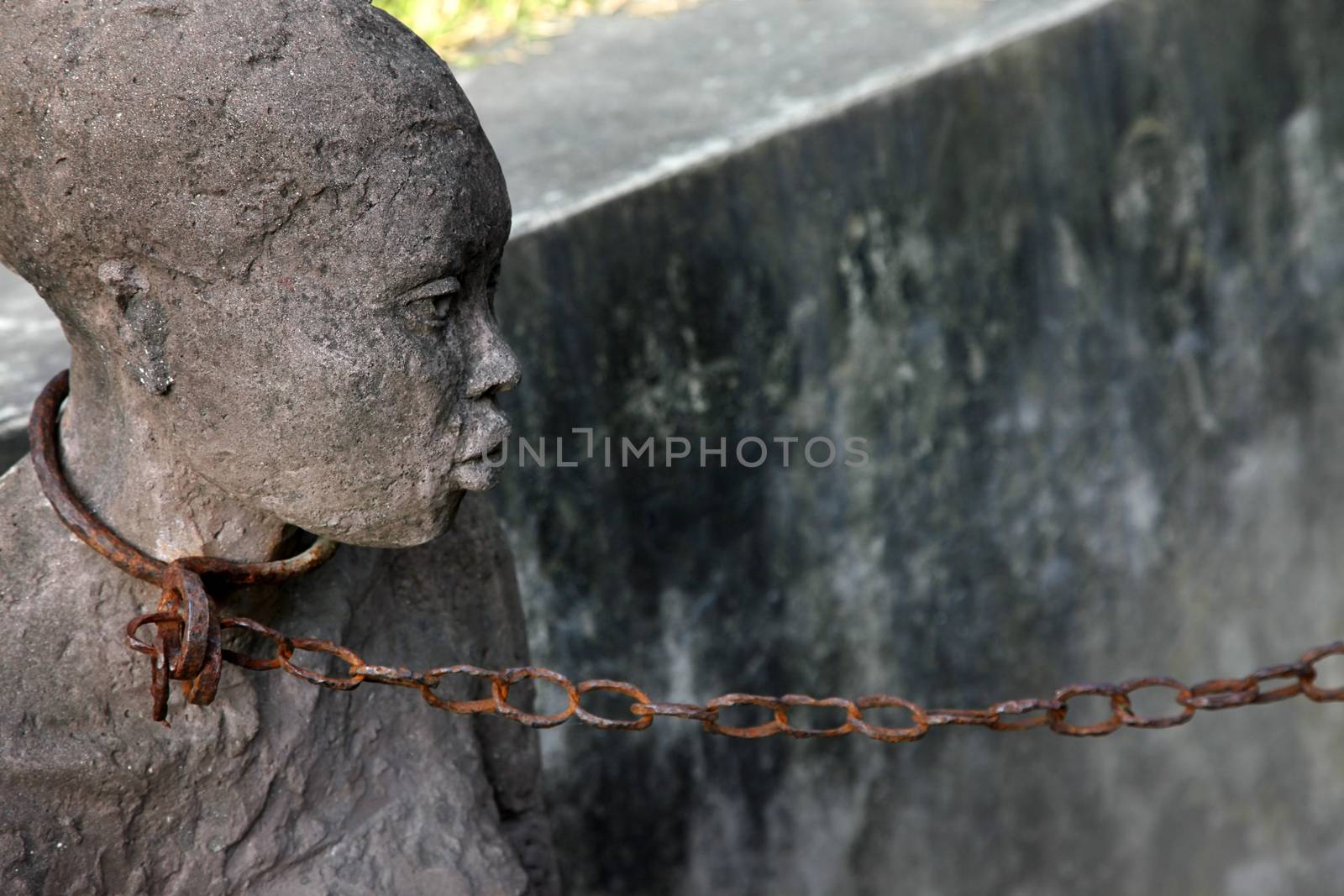 A statue in Stone Town. Zanzibar dipicting and mourning the African slave trade