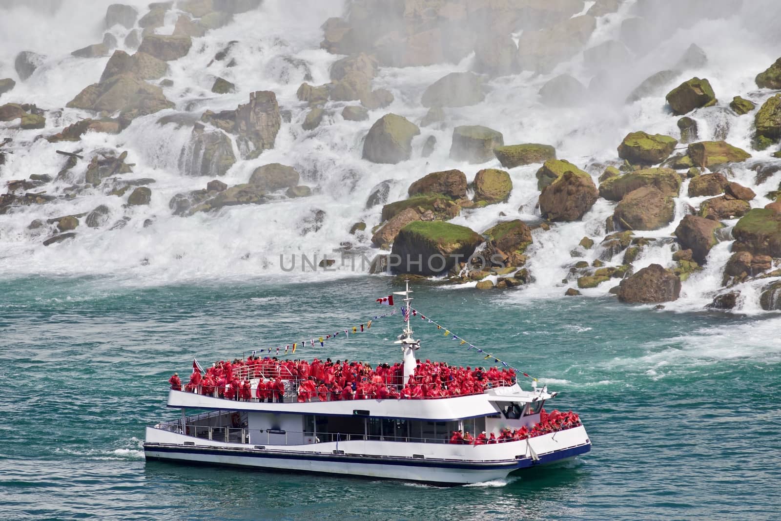 Beautiful isolated image of a ship and amazing Niagara waterfall by teo