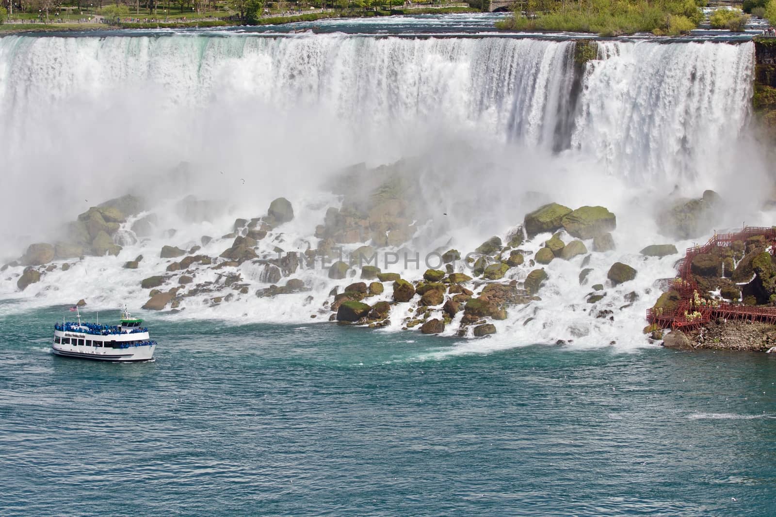 Beautiful photo of a ship near amazing Niagara waterfall