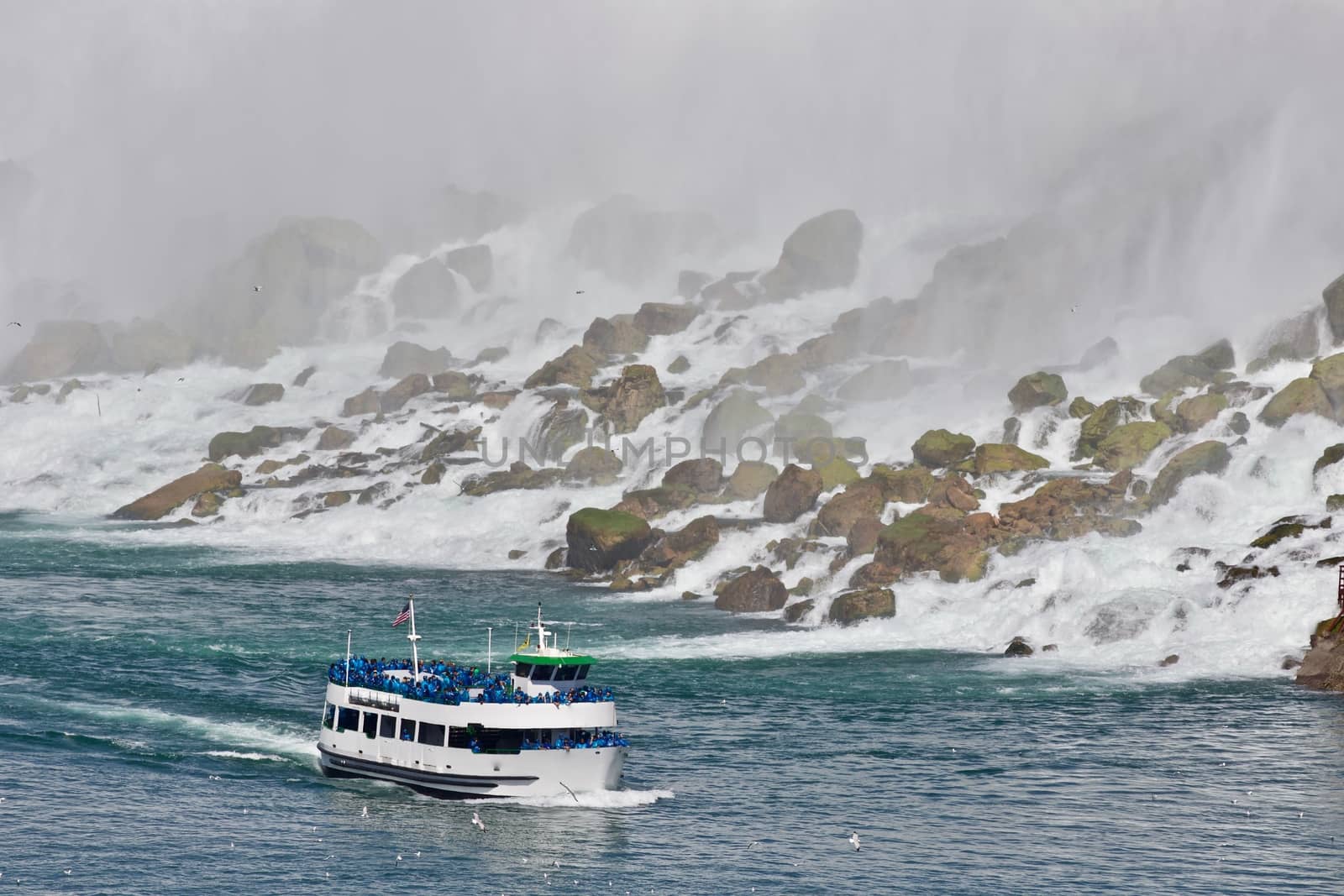 Beautiful photo of a ship near amazing Niagara waterfall