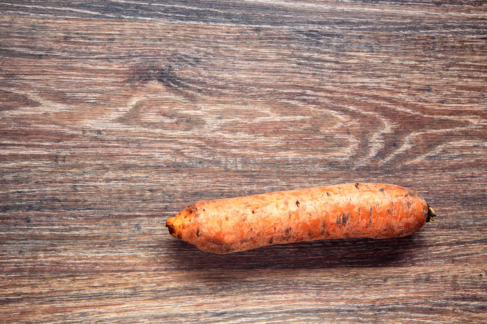 carrot on wood. Top View on wooden table with Copy Space. Ingredients for 