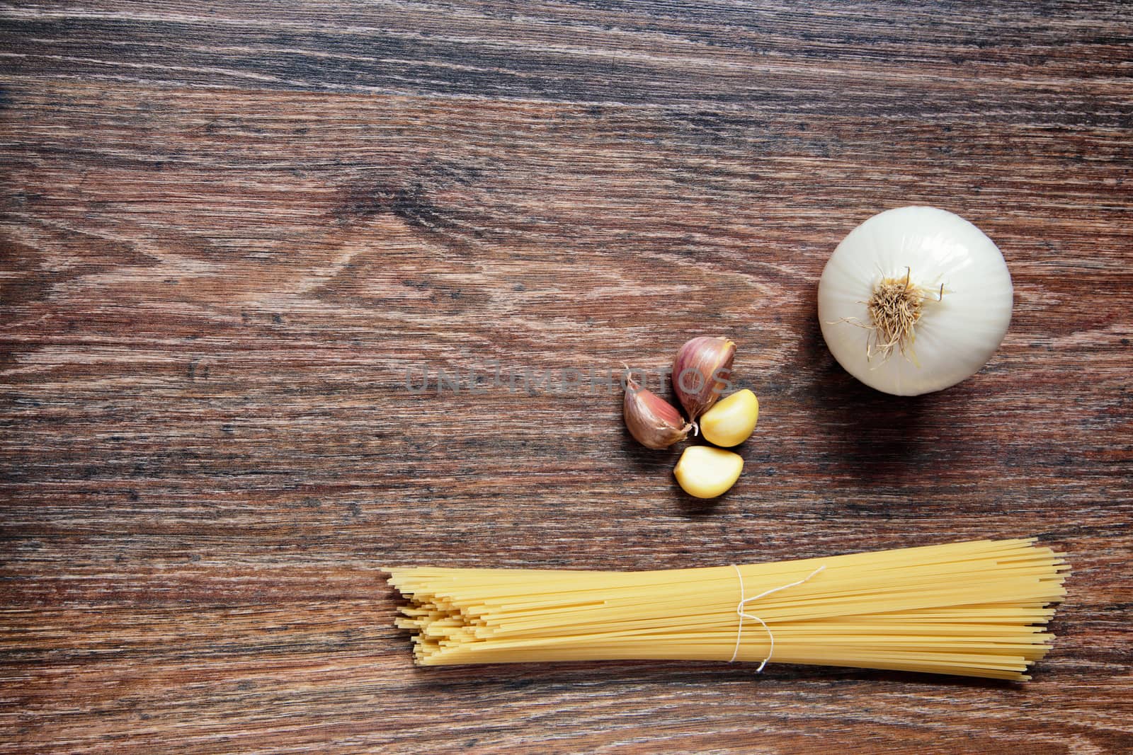 Ingredients for spaghetti bolognese on wooden background. Vegetables on wood. Top View on wooden table with Copy Space