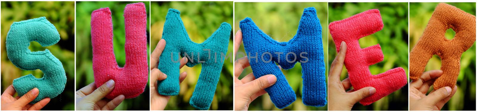 Summer background from knitted alphabet on woman hand, summertime letter knit from colorful yarn, wonderful handmade product