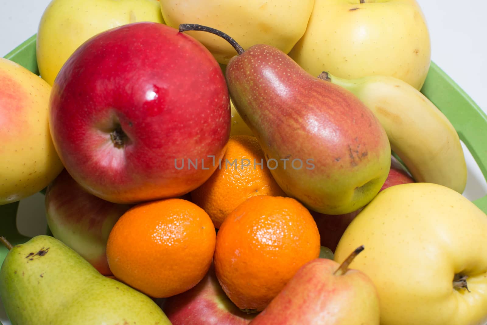 Colored fruits on table.