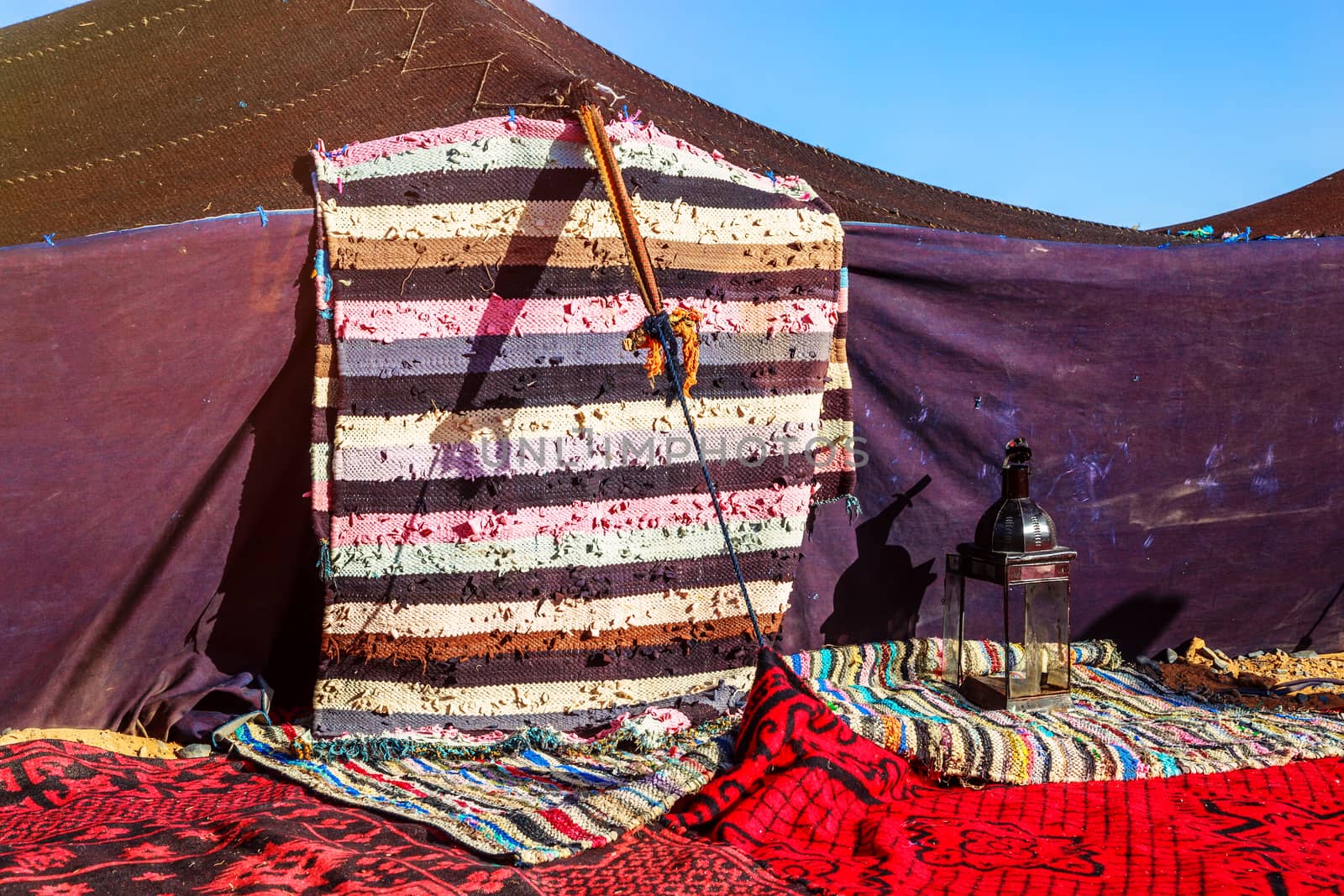 Closeup on berber nomad tents on morocco desert by pixinoo