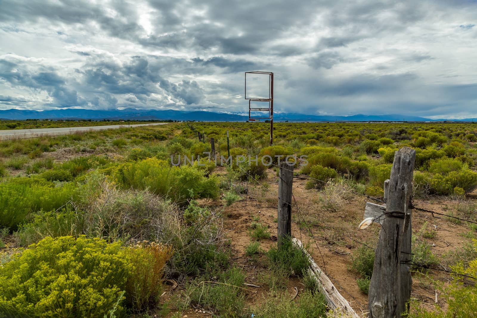 A thunder storm approaches from the mountains along US Highway 160 in Colorado.