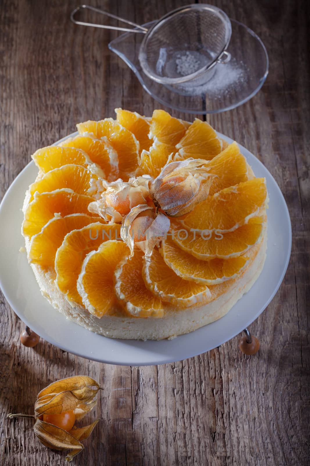 Cheesecake decorated with oranges and physalis. by supercat67