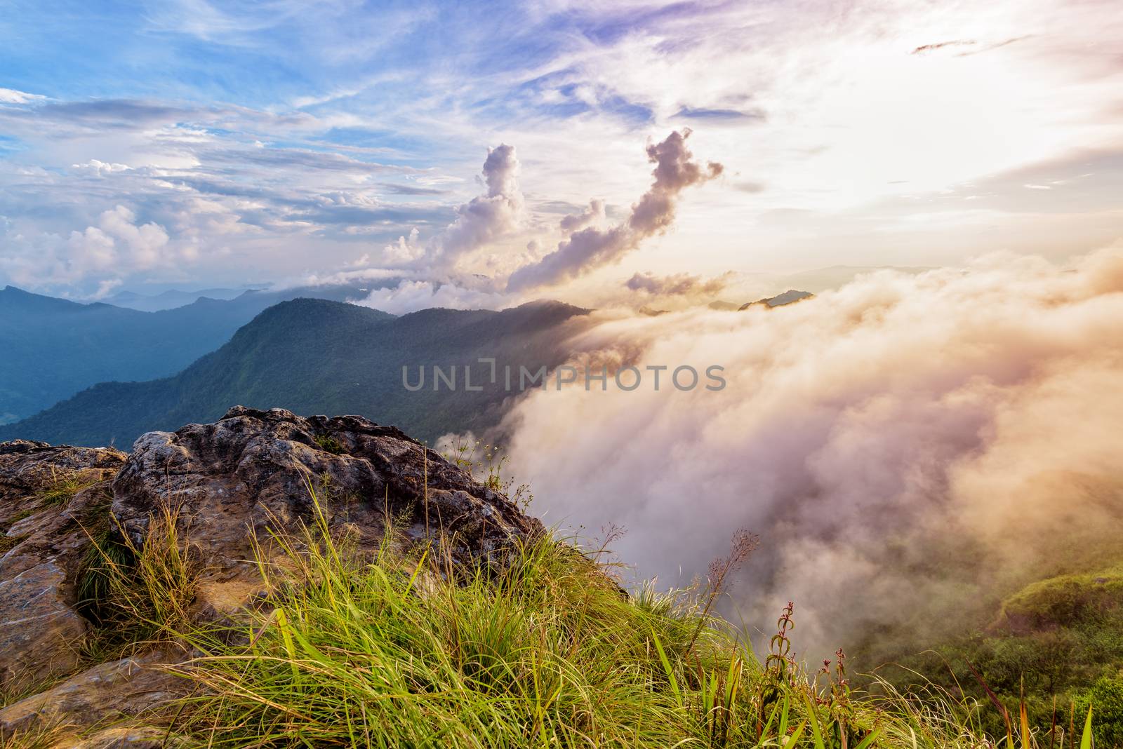 Beautiful landscape nature of high mountain colourful sunlight cloud and sky on Phi Pan Nam Range during sunset in winter from viewpoint Phu Chi Fa Forest Park at Chiang Rai Province Thailand