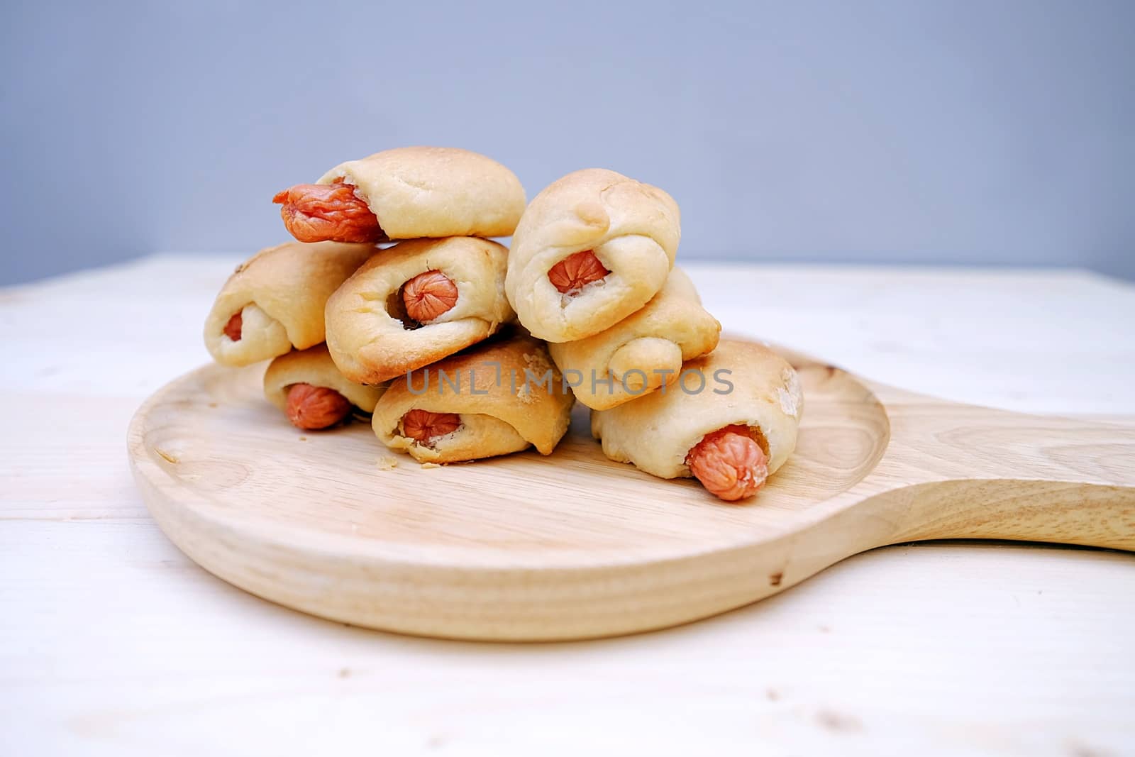 Sausage Bread in Dish on Table Wood